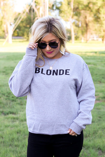 blonde sweatshirt