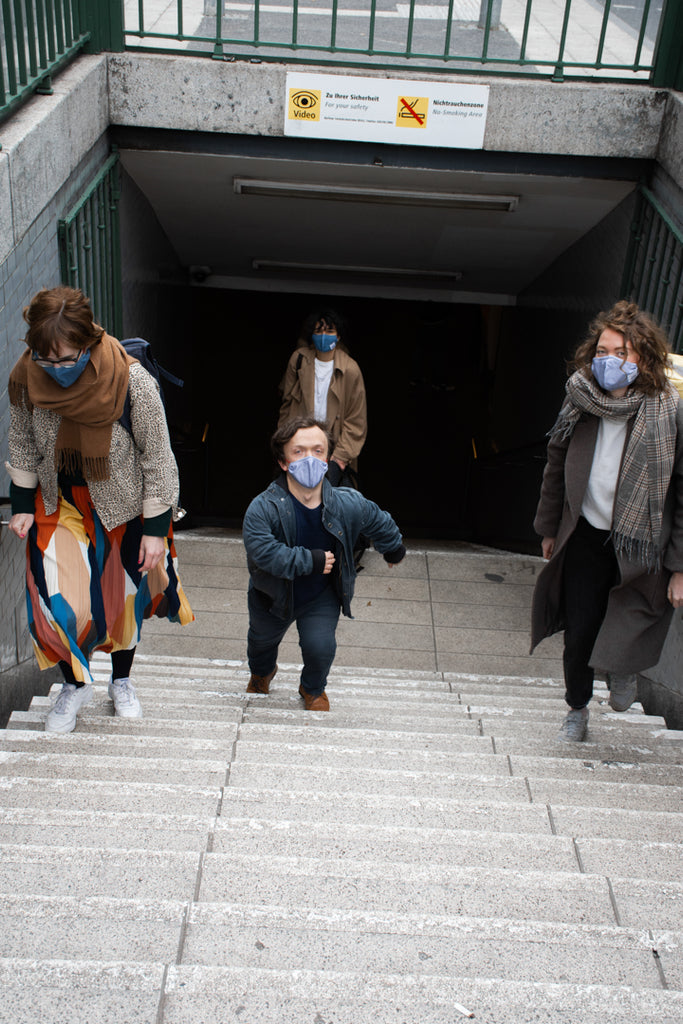 Sema Gedik Team On Stairs wearing face Masks