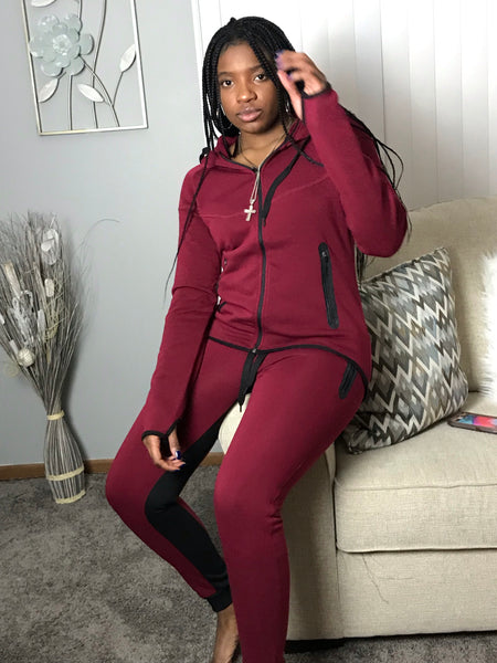 burgundy nike tech suit