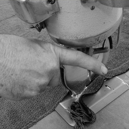 Cudo Dining Chair Performance Fabric being sewn on plant floor