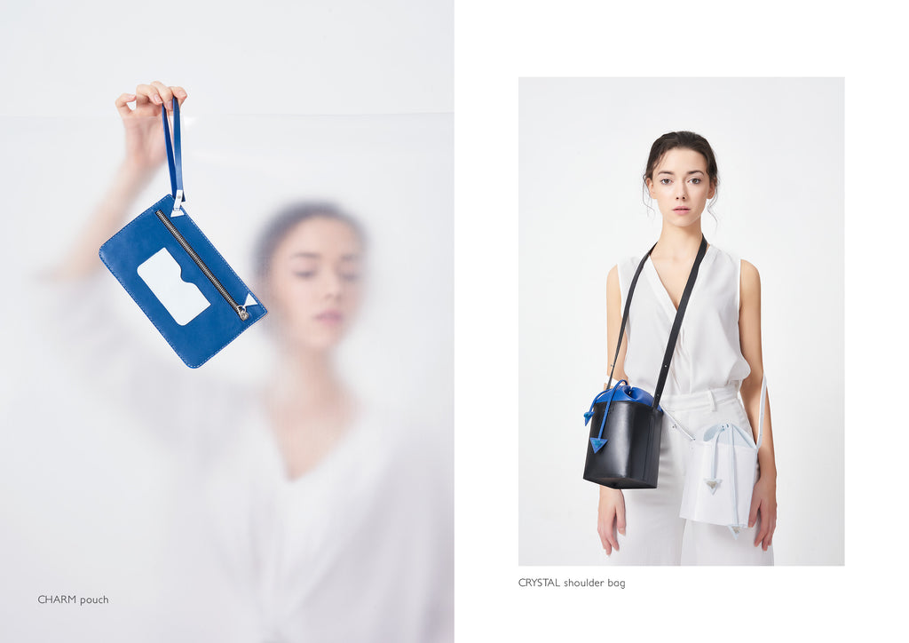 Dream's Code electric blue leather pouch with white details + black leather bucket bag