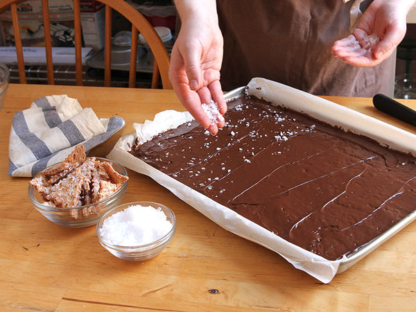 Sprinkle sea salt to finish cannoli chip toffee