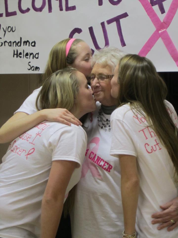 women kissing grandmother