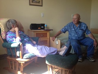 dementia woman and husband inside home