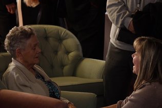 elderly woman with dementia having a conversation