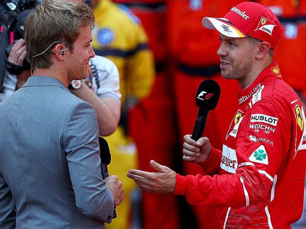 Nico Rosberg and Ferrari's Sebastian Vettel - F1