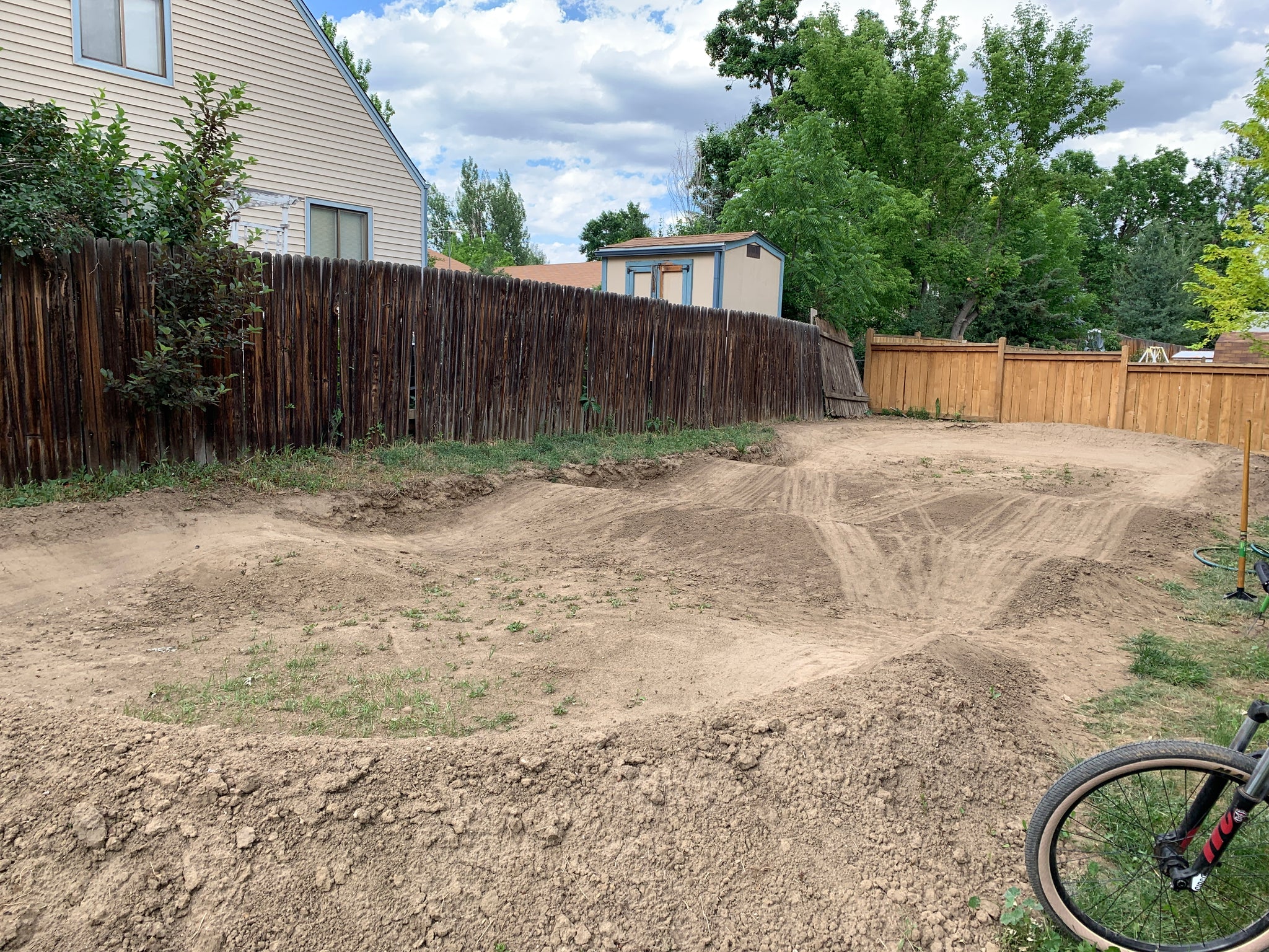 Build a backyard small oval pump track 