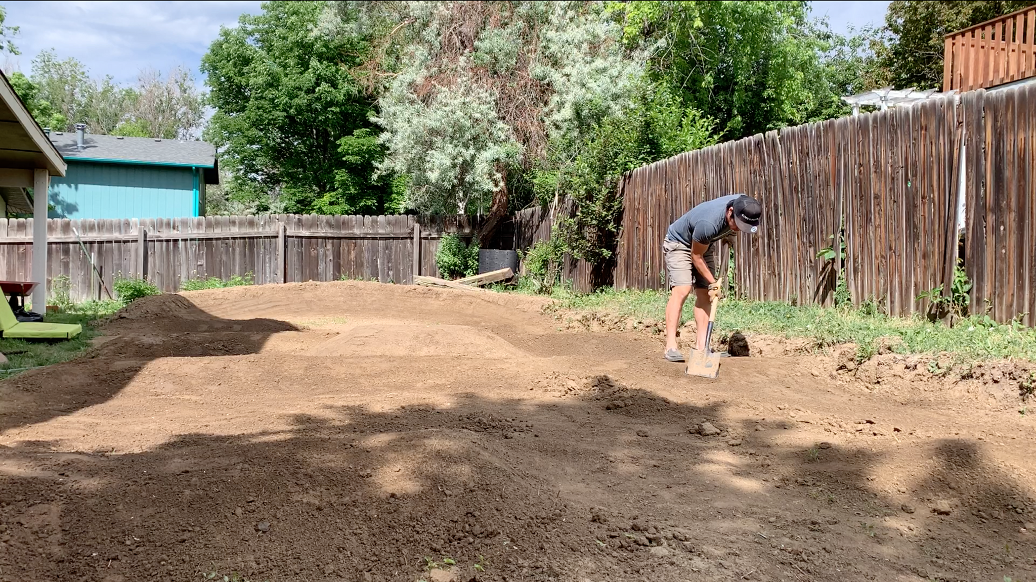 Digging with a flat shovel backyard pump track