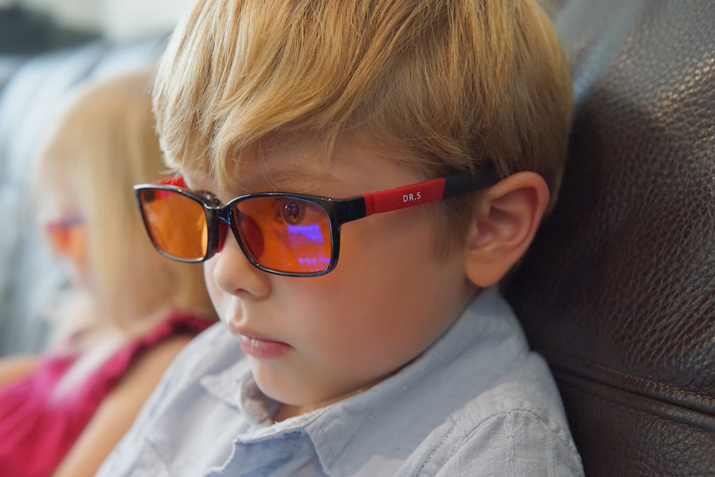 Up Close of a Boy Wearing Blue Light Blocking Glasses