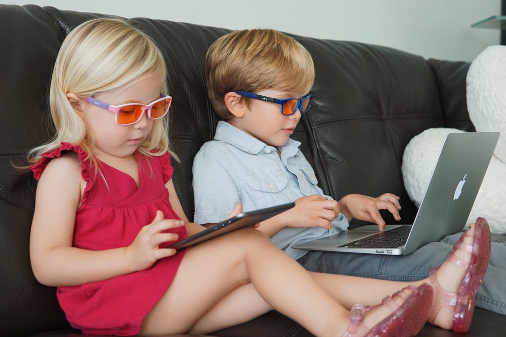 Two Children Wearing Blue Light Blocker Glasses