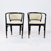 A pair of Austrian Secessionist Armchairs designed by Gustav Siegel