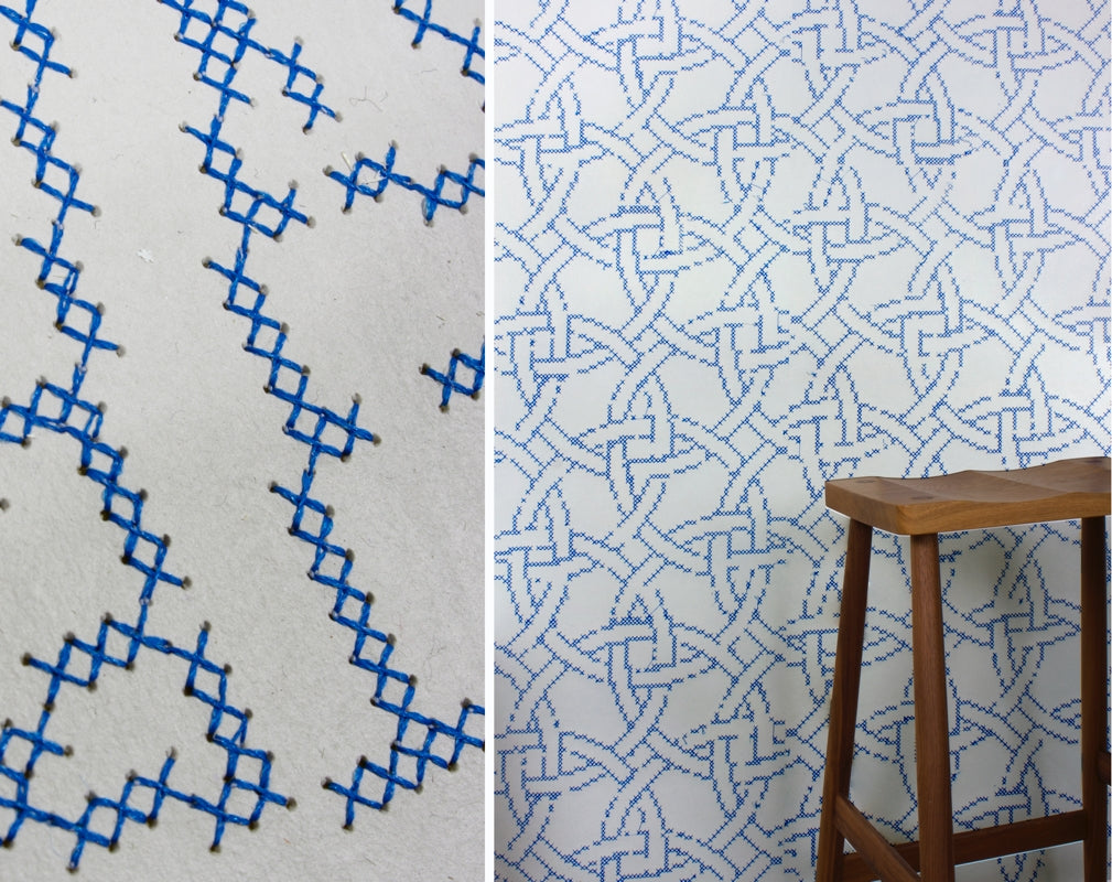 A detail and lifestyle image show the intricate pattern of New Cross Embroidered wallpaper by CUSTHOM
