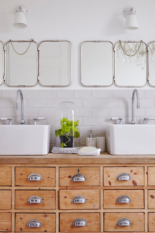 A vintage style bathroom from Run For The Hills residential interior design project East London Villa