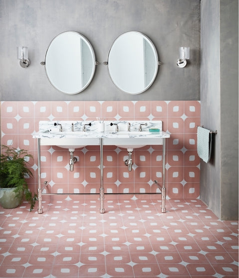 An industrial chic bathroom features the Double Chessleton Vanity basin from Drummonds