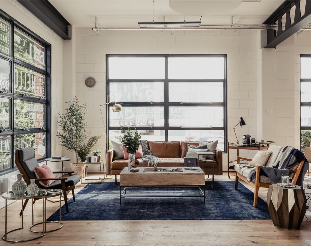 Industrial decor features in the seating area at Wireless Factory designed by Run For The Hills