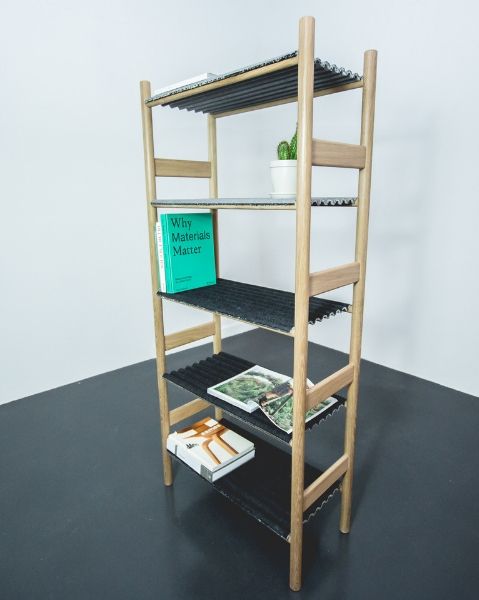 Benjamin Stanton's shelving is made from an oak frame with corrugated denim shelves