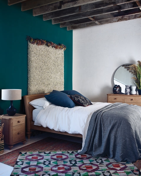 Habitat's Sabine bed and Flounce rug from the AW18 collection feature in a rustic chic bedroom