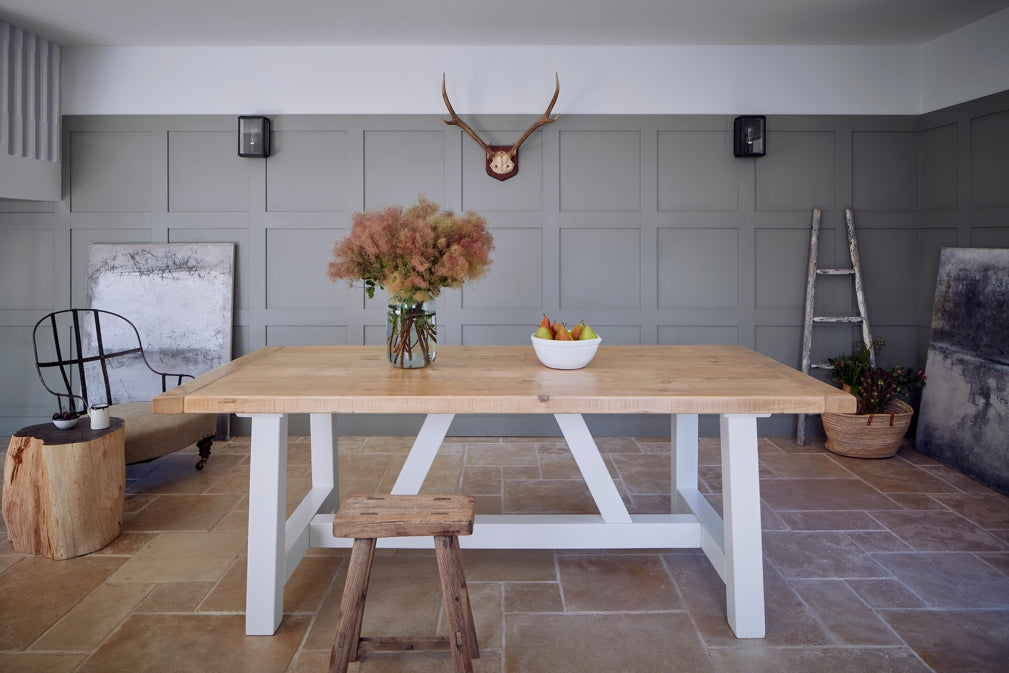 Home Barn's North American solid timber Mill dining table is the centrepiece of a rustic dining scheme