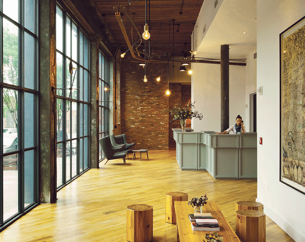 industrial interior scheme of the lobby at the wythe hotel brooklyn new york