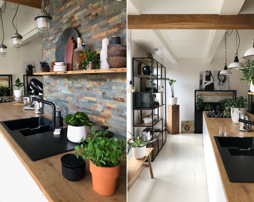 Jellina Detmar's industrial style farmhouse. Natural wood and plants in the kitchen help to soften the strong monochrome colour palette.
