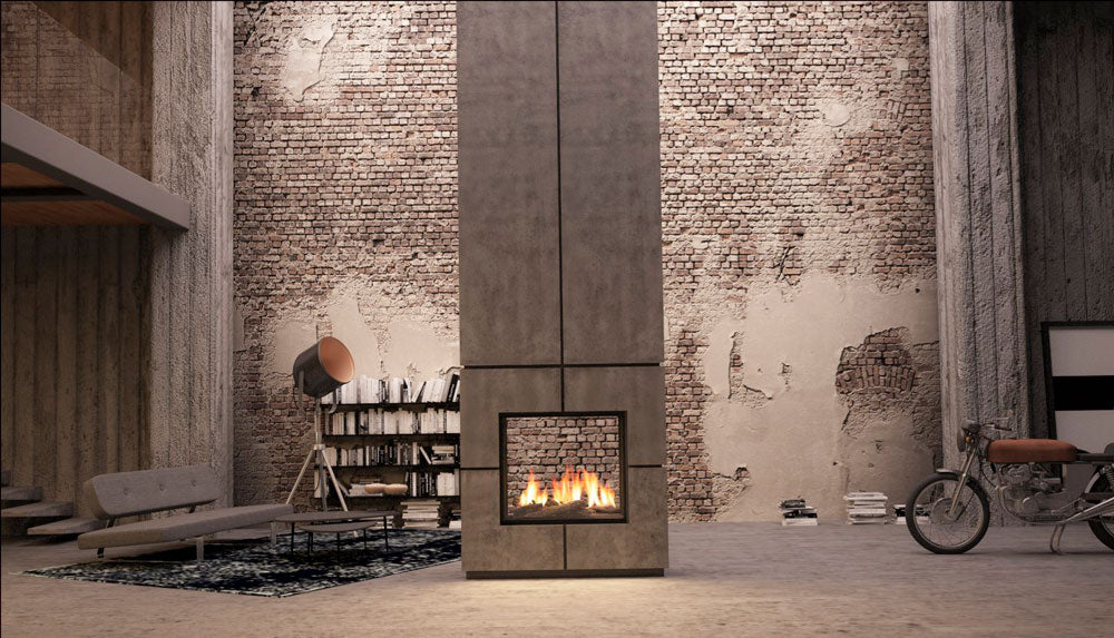 A contemporary fire from Living Fire set in an industrial building with exposed brick and concrete pillars