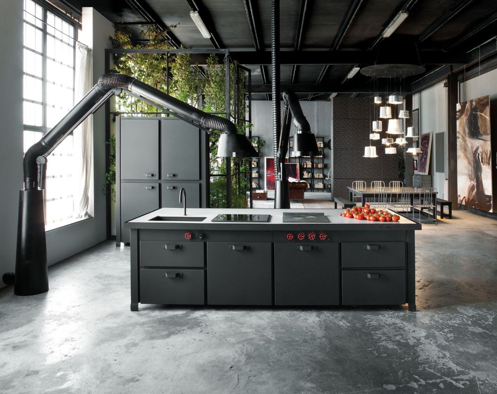 Minacciolo Mina Black Kitchen in an industrial loft in Milan with enormous freestanding cooker hoods