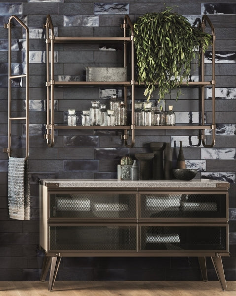 The Stock Rack system features shelves with an aluminium frame, in a bronze-finish, and Smoky Glass surfaces.