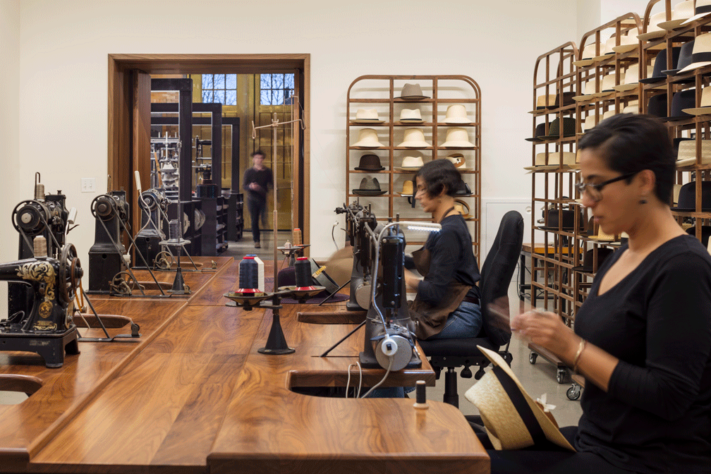 optimo hat factory workshop two women sewing industrial architecture design studio 