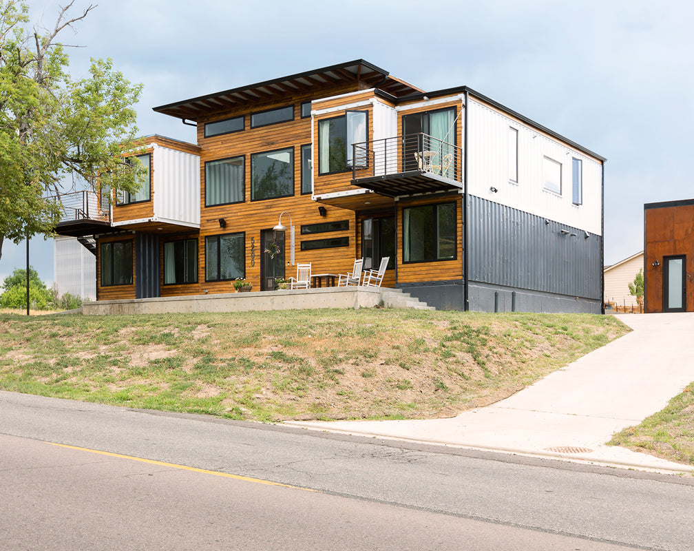 Shipping-container-industrial-style-home-garden-tree-drive-garage-warehouse-home