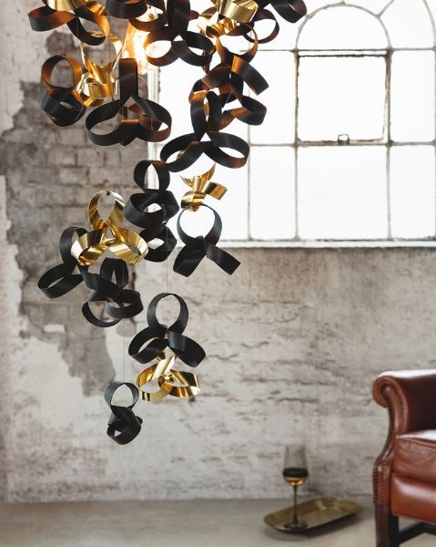 Tom Raffield Noctis Giant Flock Chandelier in an industrial setting