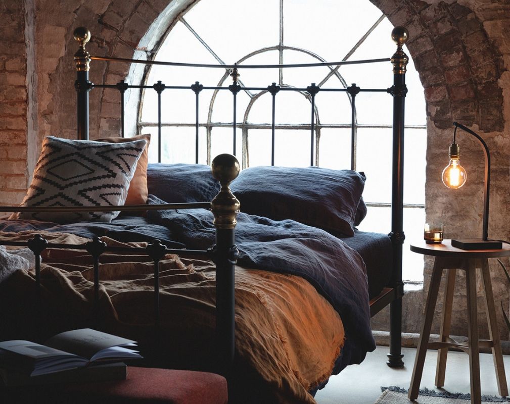 Tom Raffield Noctis Lighting range in an industrial style bedroom