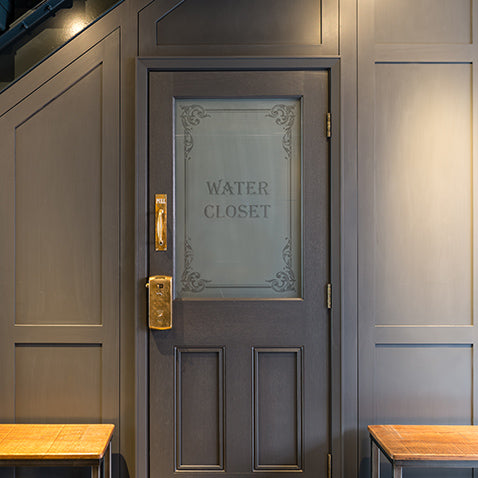 victorian water closet decal features in the bathroom of this bermondsey warehouse conversion