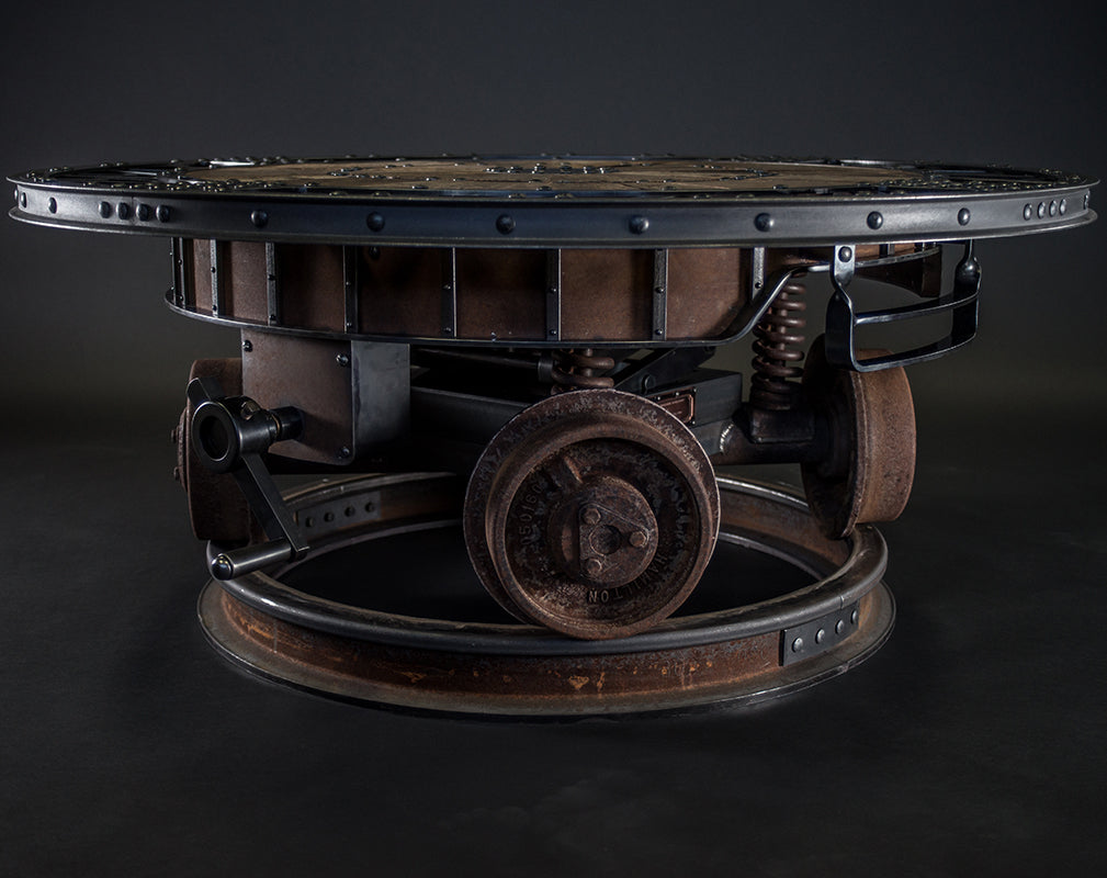 industrial revolution statement steampunk table by cory barkman.