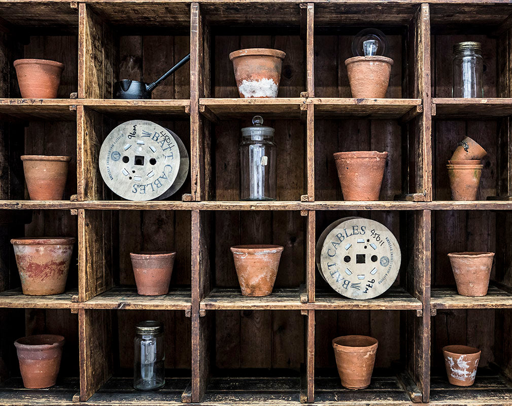 Vintage wooden post office display shelves.