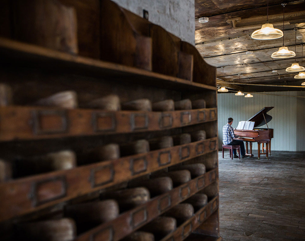 Rustic warehouse wedding venue by Artifact Lighting. 