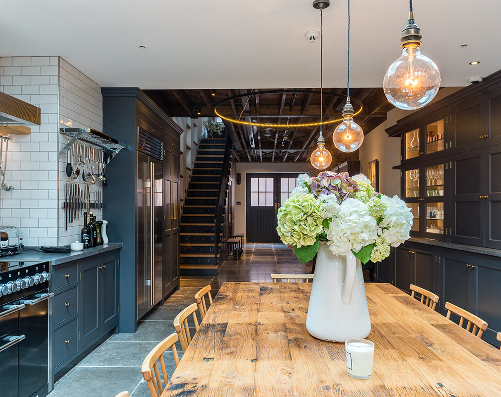 Traditional joinery features in this expansive warehouse kitchen.