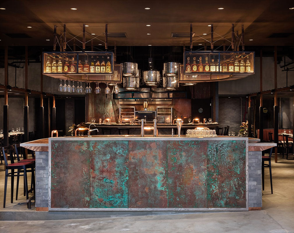 Rhoda Hong Kong restaurant interior by Joyce Wang Garage Doors, smoked metal, charred wood and reclaimed materials