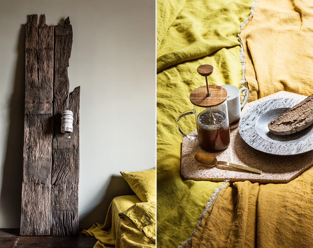 ochre yellow bedroom scheme in a converted warehouse