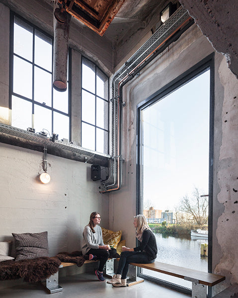 converted grain silo with raw industrial features