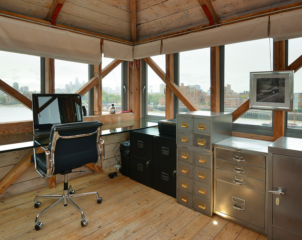 home office with panoramic views of river thames inside this london warehouse conversion