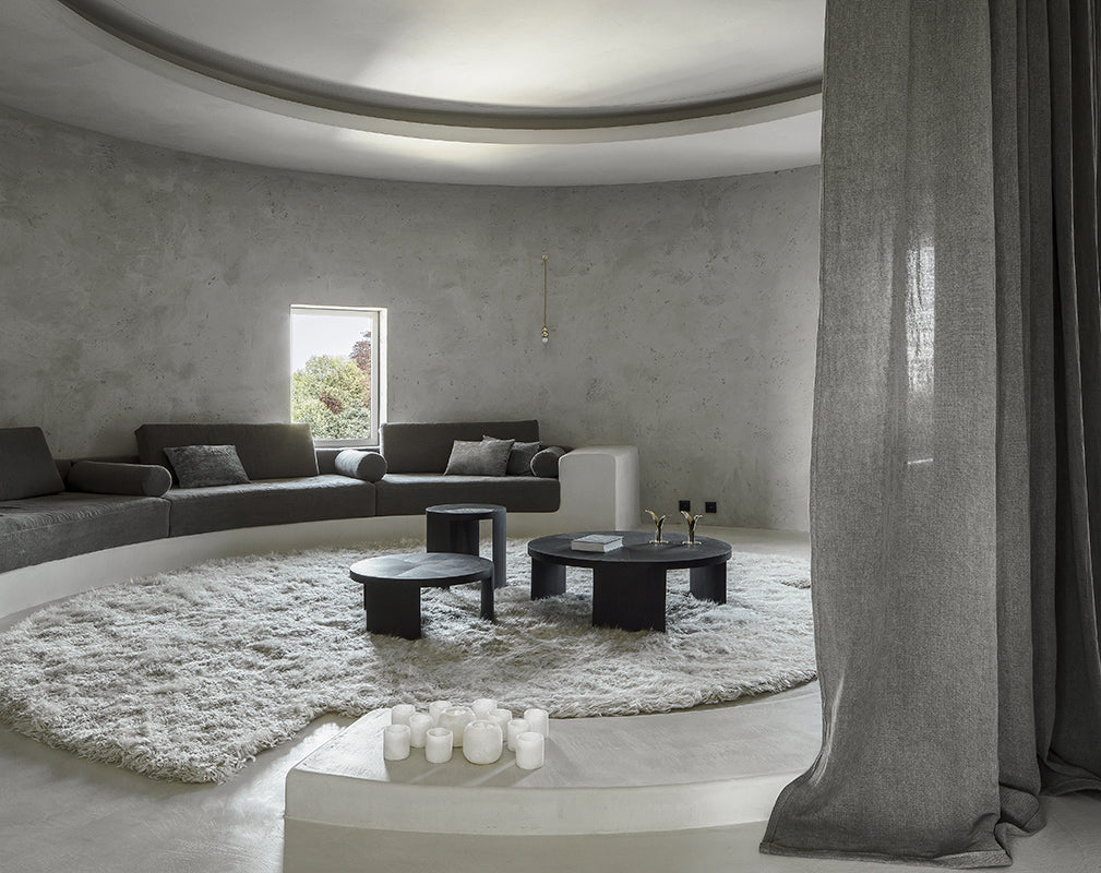 minimalist living room scheme within a converted concrete silo in kanaal antwerp