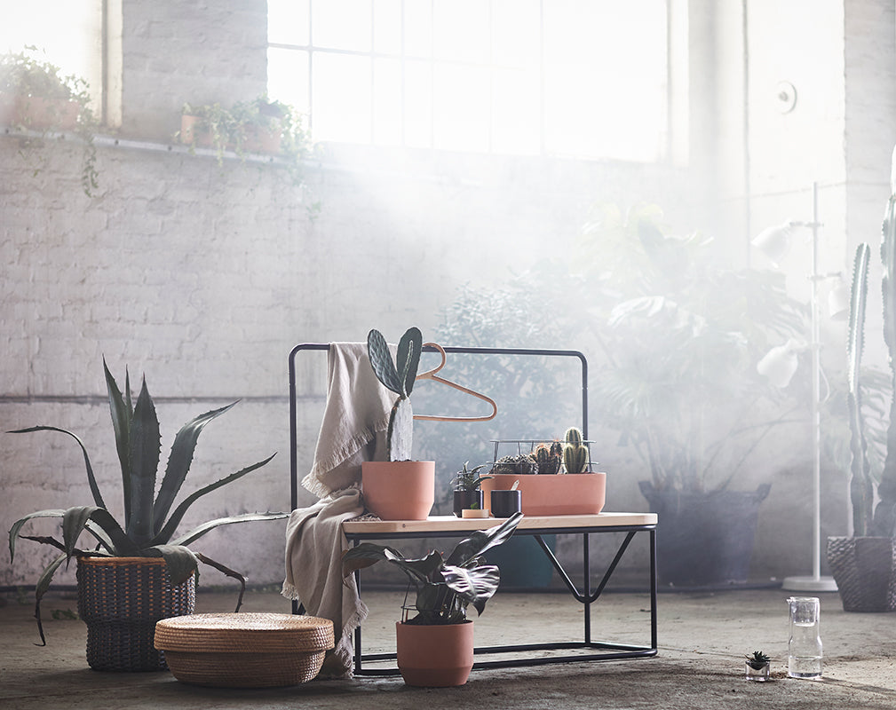 blackened metal and natural textures such as terracotta complement rattan and wicker in IKEA's latest furniture collection