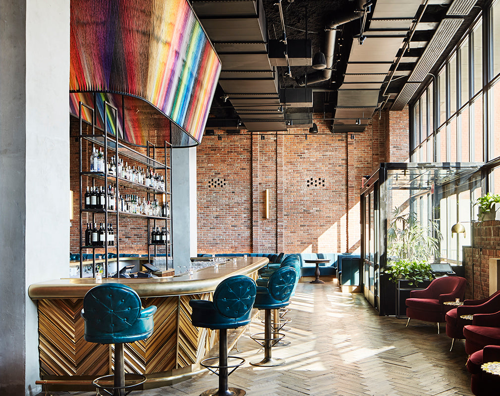 hotel bar at the williamsburg hotel brooklyn new york features exposed brick and original parquet flooring