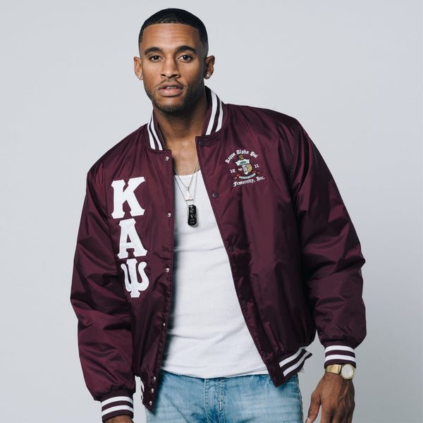 gold kappa alpha psi bomber jacket