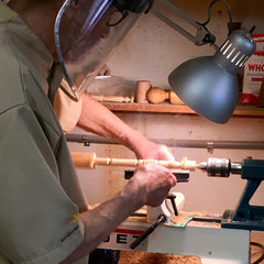 Dad working intently at his lathe, pure joy for him