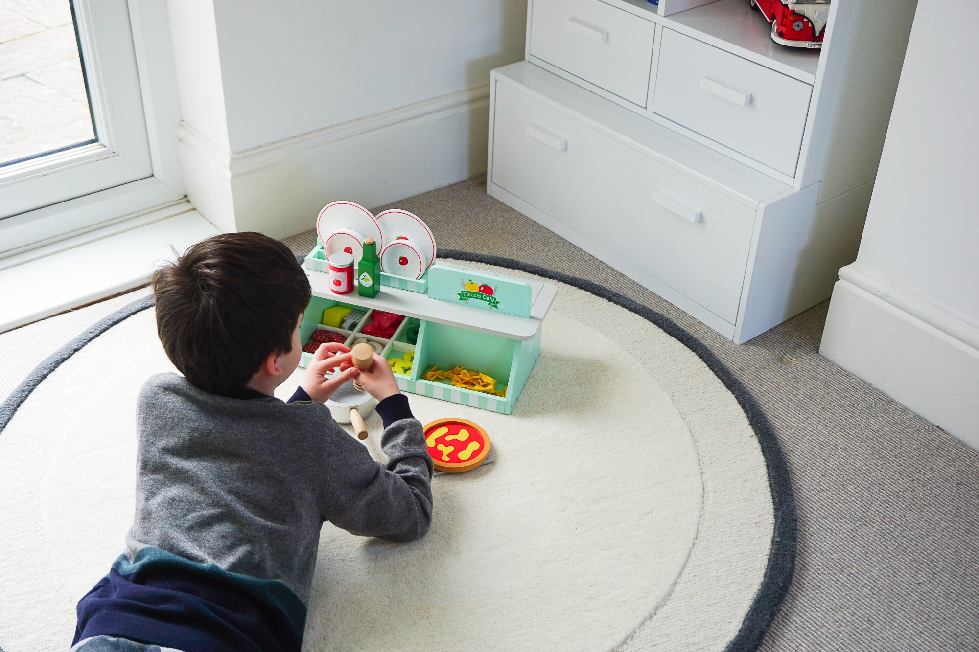 Turn your living room into a shared space with versatile toy storage