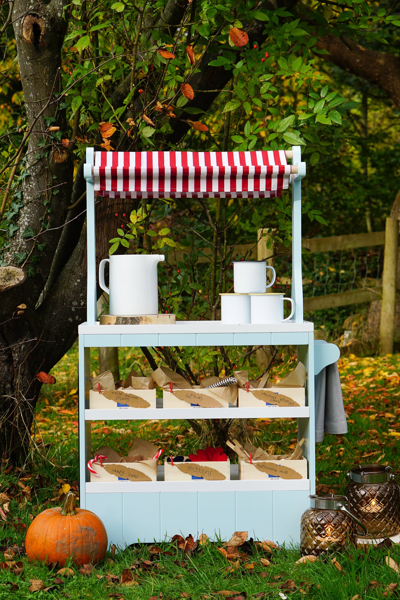 Set up a children's outdoor hot chocolate bar for hand warming role play fun