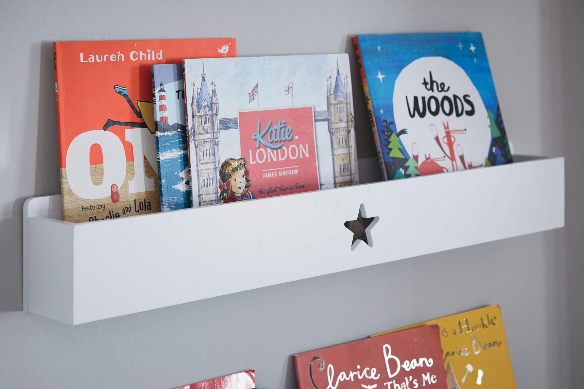 Wall shelves that double up as children's bedside tables