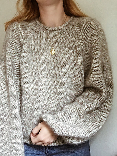 cozy knit sweater with balloon sleeves
