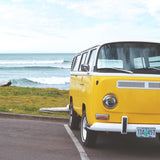 yellow Campervan at beach